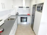 Kuchyňa alebo kuchynka v ubytovaní GMID IMMO Apartamento Oasis