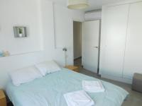 Posteľ alebo postele v izbe v ubytovaní GMID IMMO Apartamento Oasis