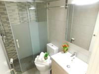 Kúpeľňa v ubytovaní GMID IMMO Apartamento Oasis
