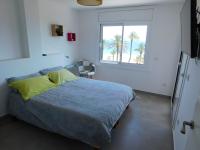 Posteľ alebo postele v izbe v ubytovaní GMID IMMO Apartamento Oasis