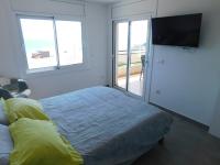 Posteľ alebo postele v izbe v ubytovaní GMID IMMO Apartamento Oasis