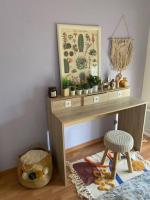 a wooden desk in a room with a chair at Grand appartement F3 - Centre- ville Le Bourget in Le Bourget