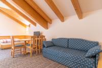 A seating area at Albergo Canazei