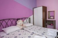Posteľ alebo postele v izbe v ubytovaní Tutti Frutti Home