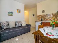 A seating area at Apartments Lina