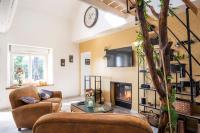 Telewizja i/lub zestaw kina domowego w obiekcie Relaxing cottage bain nordique