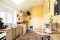 Kuchnia lub aneks kuchenny w obiekcie Relaxing cottage bain nordique
