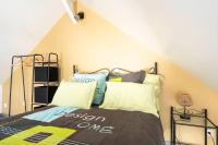 Łóżko lub łóżka w pokoju w obiekcie Relaxing cottage bain nordique