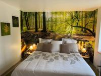 Łóżko lub łóżka w pokoju w obiekcie Relaxing cottage bain nordique