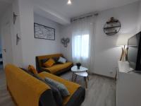 TV a/nebo společenská místnost v ubytování Apartamento Rodhes playa 2-A5