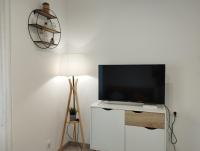 TV a/nebo společenská místnost v ubytování Apartamento Rodhes playa 2-A5
