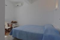 Postel nebo postele na pokoji v ubytování Degaetas Resort