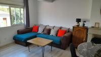 Część wypoczynkowa w obiekcie Appartement lumineux et central