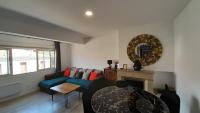 Część wypoczynkowa w obiekcie Appartement lumineux et central