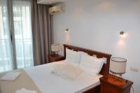 Postel nebo postele na pokoji v ubytování Port Balchik apartment