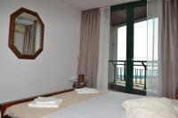 Postel nebo postele na pokoji v ubytování Port Balchik apartment