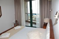 Postel nebo postele na pokoji v ubytování Port Balchik apartment
