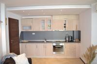 Kuchyň nebo kuchyňský kout v ubytování Port Balchik apartment