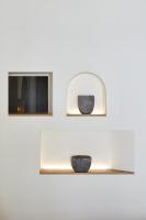 a couple of shelves on a wall with two vases at Hotel & Spa Blau Parc in San Antonio
