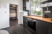 Kuchyň nebo kuchyňský kout v ubytování Boutique Hotel Mezi švy