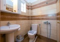 A bathroom at Apartments Lina