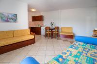 A seating area at Apartments Lina