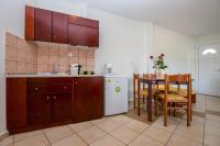 A kitchen or kitchenette at Apartments Lina
