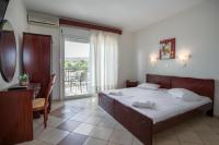 A bed or beds in a room at Apartments Lina