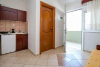 A kitchen or kitchenette at Apartments Lina