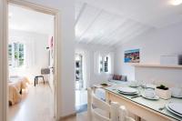 A bed or beds in a room at Ariti Apartments