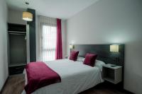 Postel nebo postele na pokoji v ubytování Apartamentos Capua