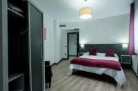 Postel nebo postele na pokoji v ubytování Apartamentos Capua