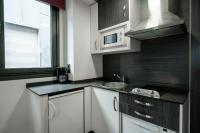 Kuchyň nebo kuchyňský kout v ubytování Apartamentos Capua