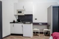 Kuchyň nebo kuchyňský kout v ubytování Apartamentos Capua