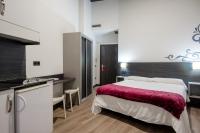 Postel nebo postele na pokoji v ubytování Apartamentos Capua