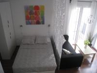 Posteľ alebo postele v izbe v ubytovaní Málaga Apartamentos - Pozos Dulces, 22