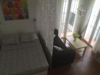 Posteľ alebo postele v izbe v ubytovaní Málaga Apartamentos - Pozos Dulces, 22