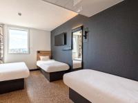 Posteľ alebo postele v izbe v ubytovaní B&B HOTEL Landerneau Bois Noir