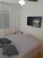 Postel nebo postele na pokoji v ubytování "EL RINCON" naturist boutique apartment