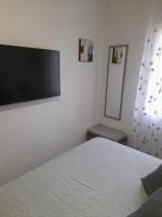Postel nebo postele na pokoji v ubytování "EL RINCON" naturist boutique apartment