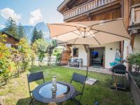 Ogród w obiekcie Bel appart 4* avec jardin privé, à 350m de la Flégère, WIFI, PARKING - FR-1-343-213