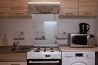 Kuchyňa alebo kuchynka v ubytovaní Квартира Warszawa