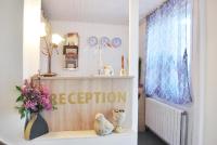 The lobby or reception area at Family Hotel Apolonia