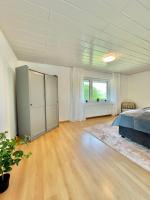 Postel nebo postele na pokoji v ubytování FeWo-Julius am Weser-Sandstrand