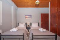 A bed or beds in a room at SOHORO Forest Hill Apartment by "elite"