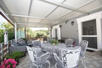 A seating area at SOHORO Forest Hill Apartment by "elite"