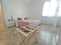 A bed or beds in a room at Casa Emmeti
