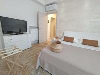 A television and/or entertainment centre at Casa Emmeti