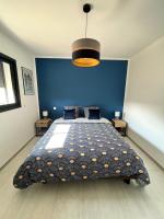 Cama o camas de una habitaci&oacute;n en Casa Lamaghjone - Villa T4 avec piscine chauff&eacute;e &agrave; 3,5km de la mer