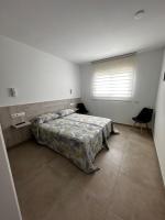 Postel nebo postele na pokoji v ubytování RAQUEL'S - Habitacions i Apartaments turístics -